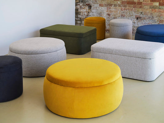 A collection of different shape and colour storage ottomans