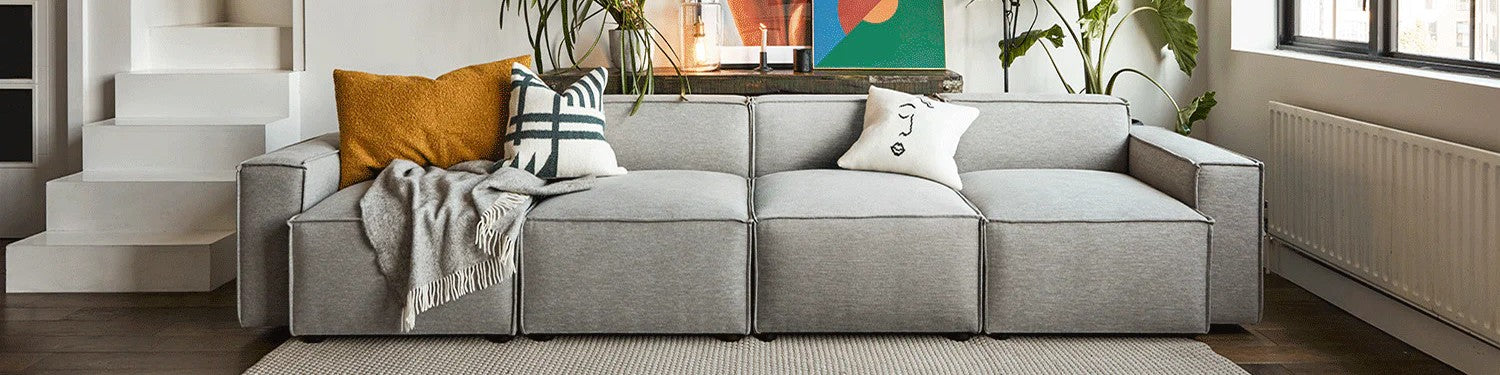 Grey fabric modular 4 seater sofa