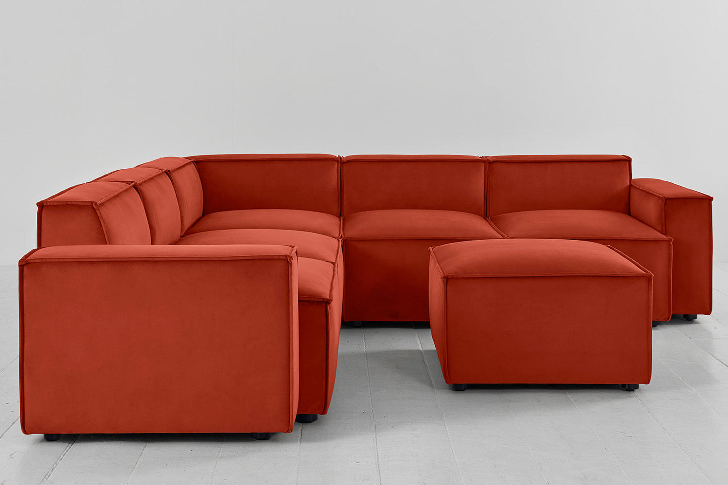 Ecksofa Model 03 mit Polsterhocker, Paprikarot