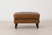 Ottoman in brown leather