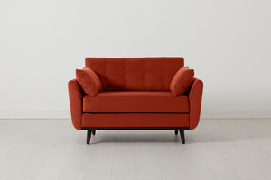 Loveseat in orange velvet