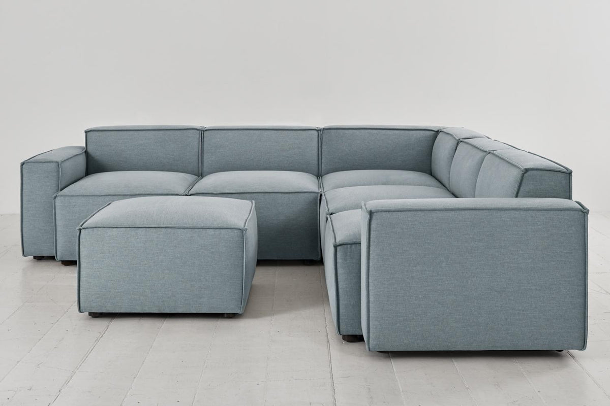 Ecksofa Model 03 mit Polsterhocker, Meerglasblau