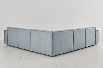 Ecksofa Model 03 mit Polsterhocker, Meerglasblau