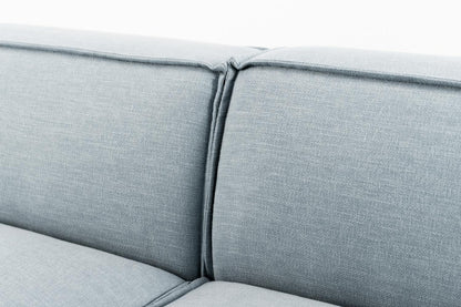 Ecksofa Model 03 mit Polsterhocker, Meerglasblau