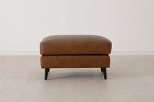 Ottoman in brown leather